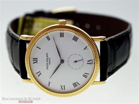 patek philippe calatrava porcelain dial 18k yellow gold watch 3919|Patek Philippe 3919.